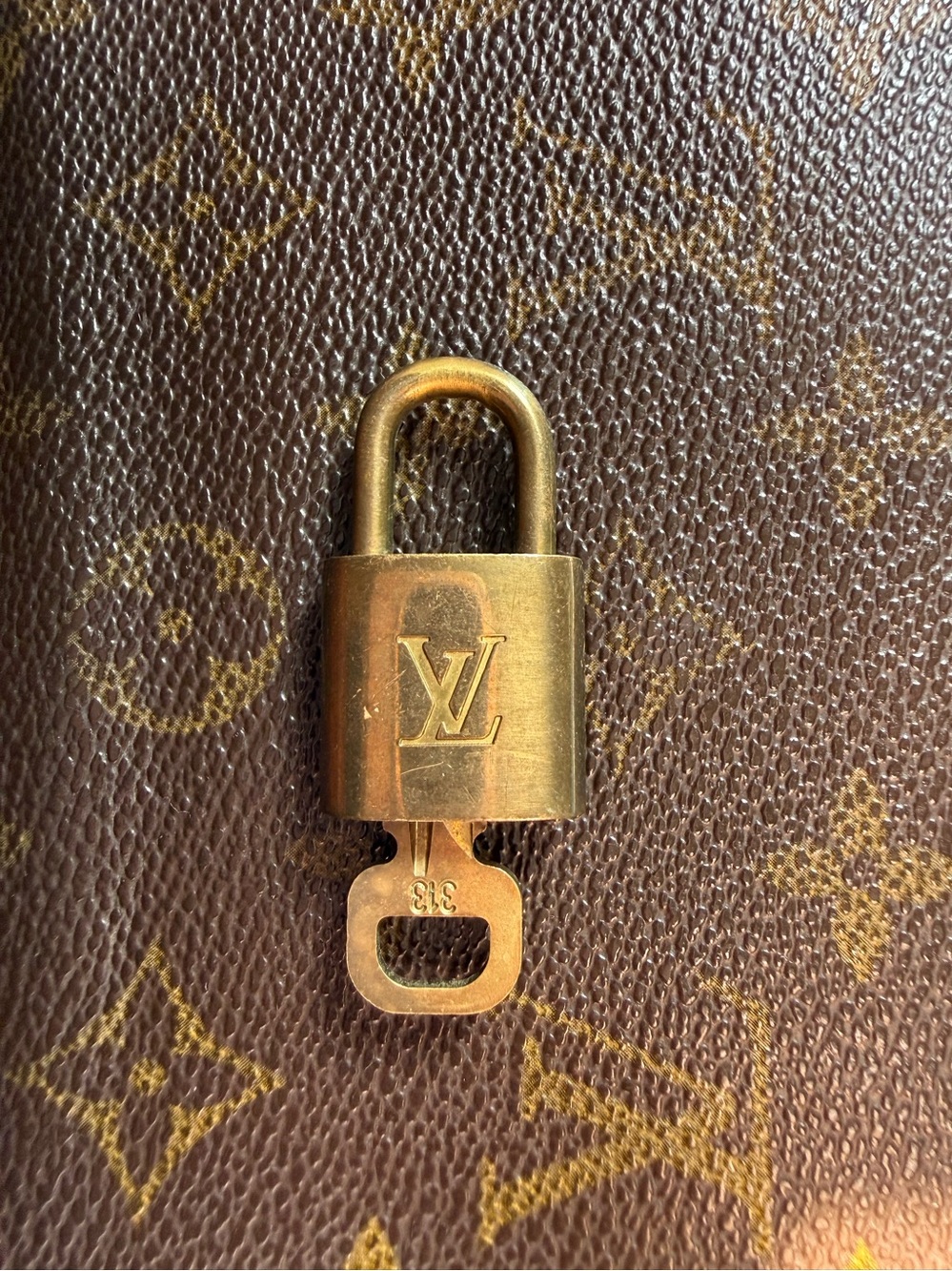 #313 Louis Vuitton Gold Padlock and Key